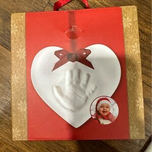 Baby's print ornament